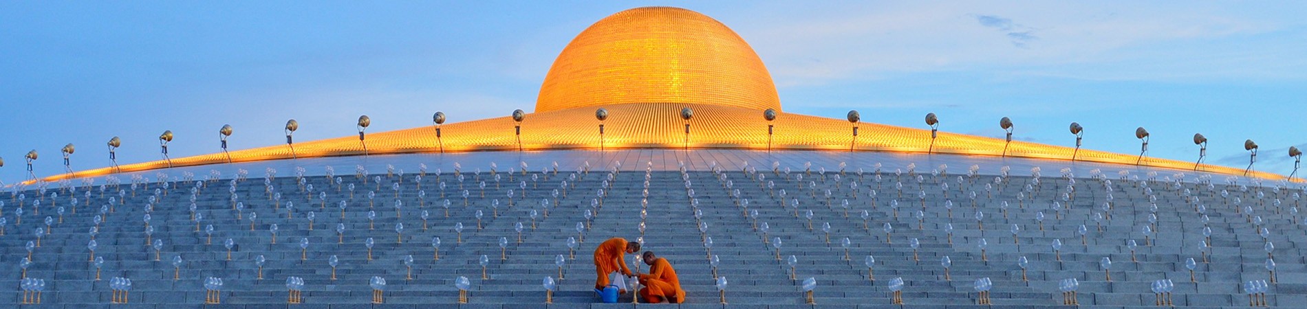 Two monks surrounded by lanterns in Wat Phra Dhammakaya