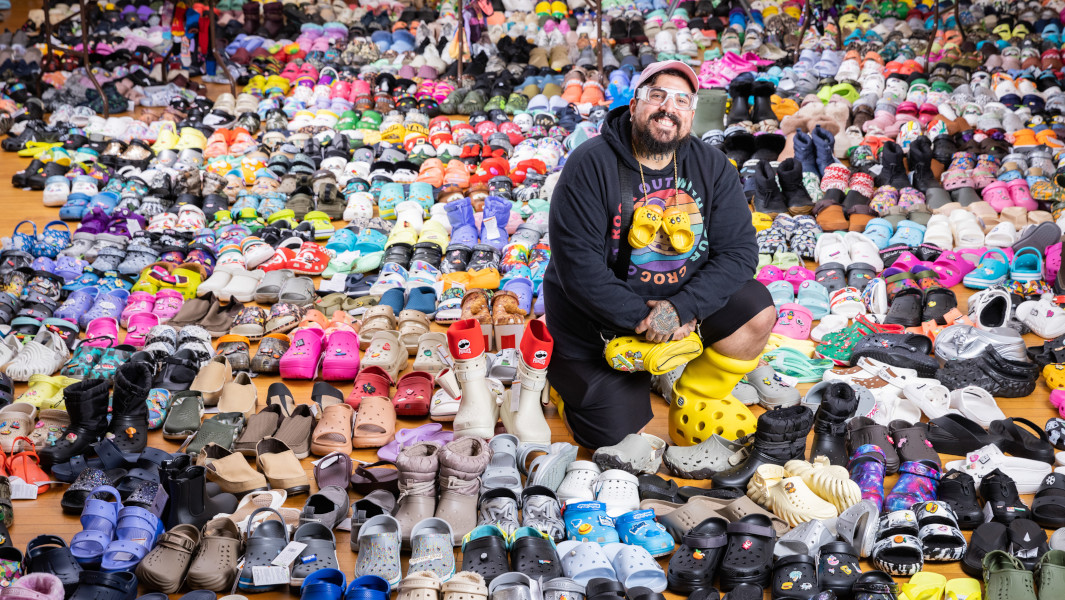 Doogie surrounded by his Crocs