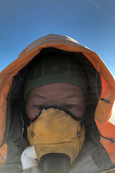 Lhakpa Sherpa wearing oxygen mask while climbing everest