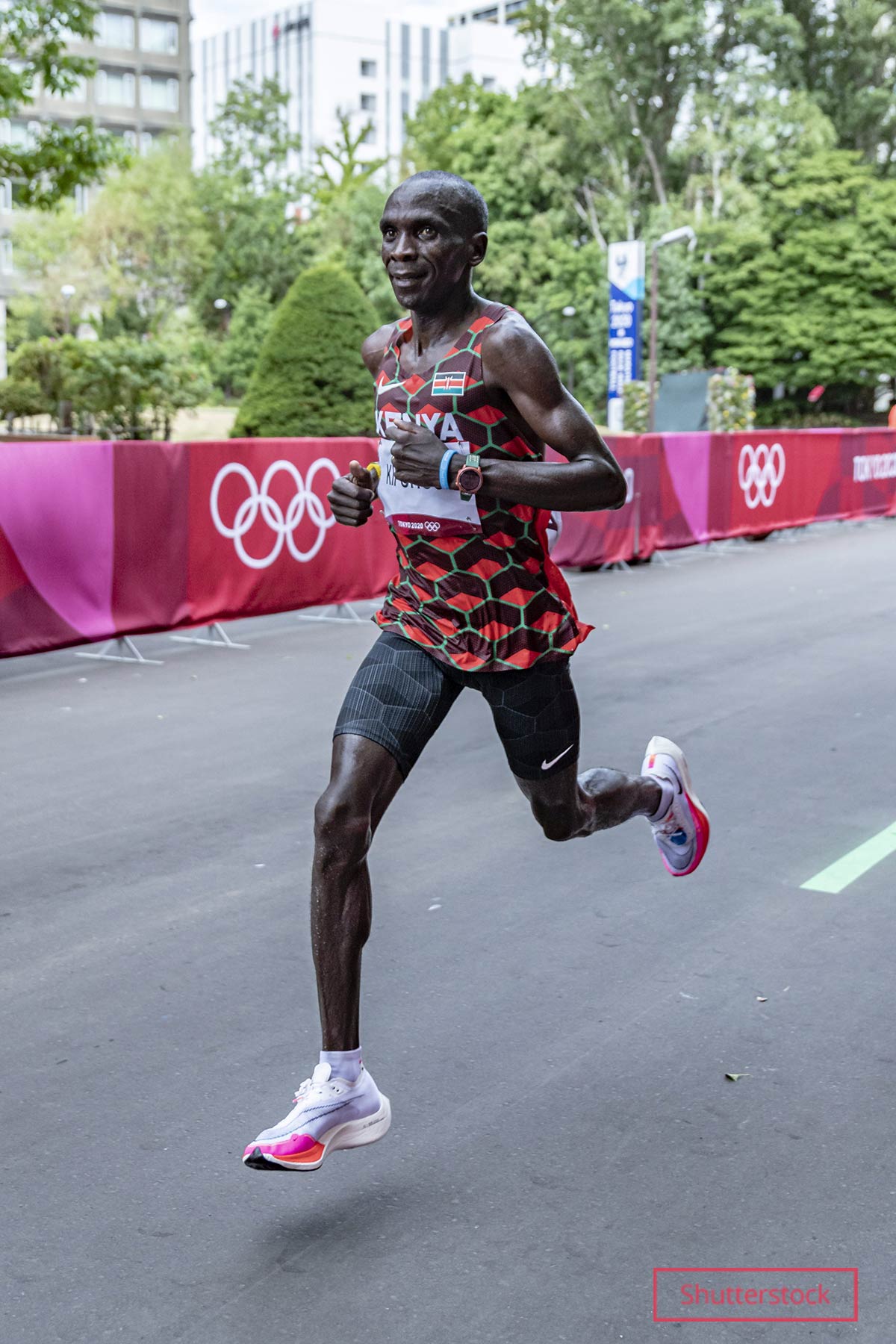 Eliud running while looking at camera