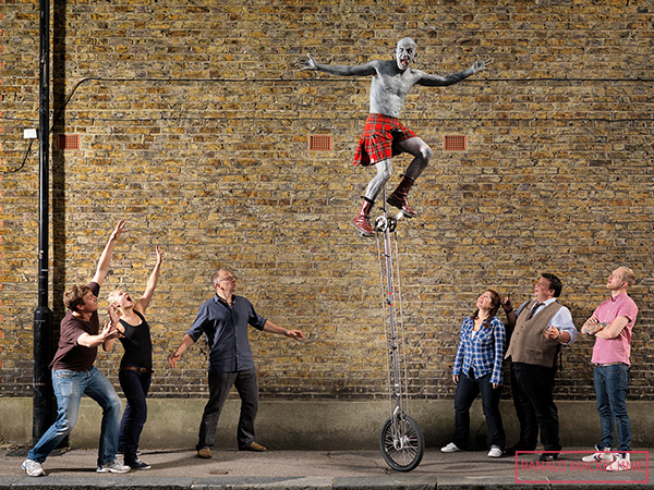 lucky diamond rich on his unicycle