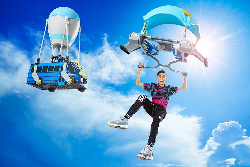 Jaden next to fortnite battle bus