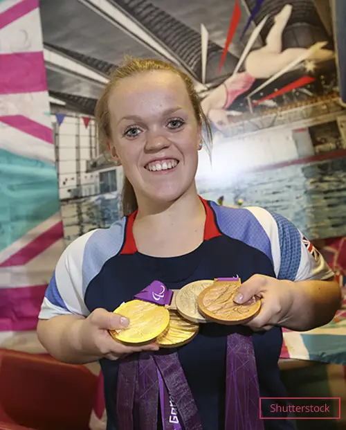 Ellie showing off her medals