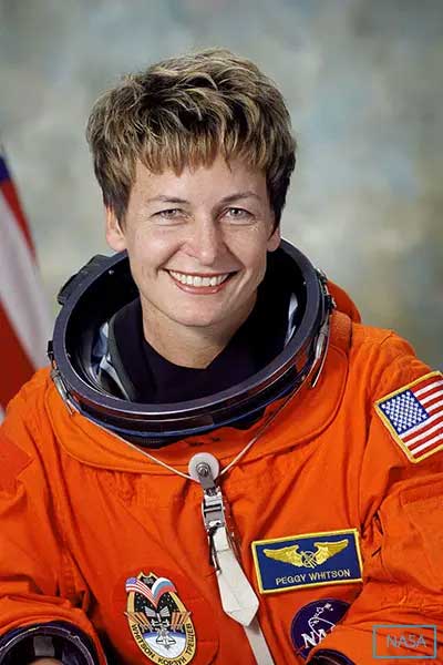 Peggy in orange astronaut suit