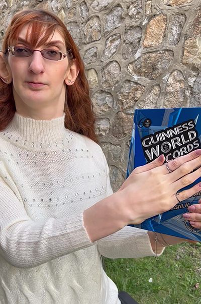 Rumeysa holding GWR book