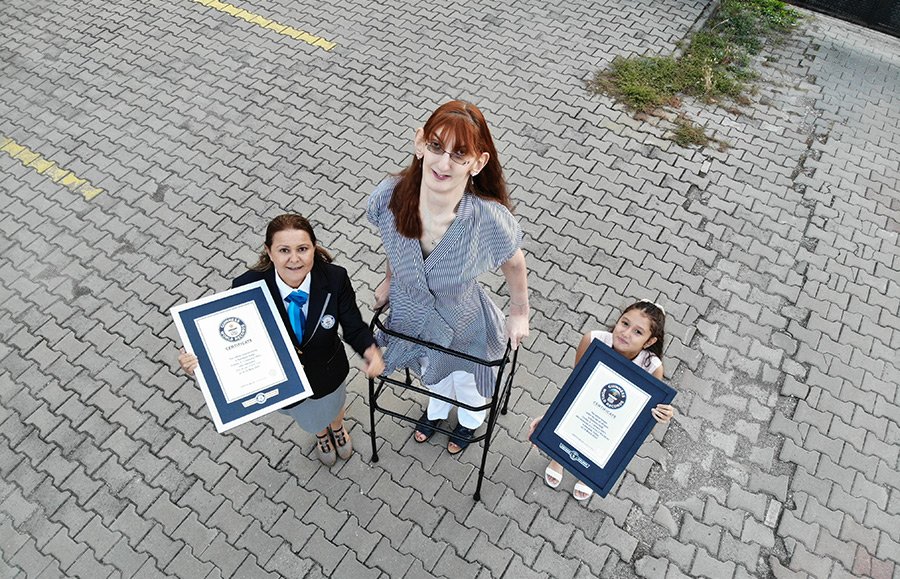 Rumeysa holding certificates