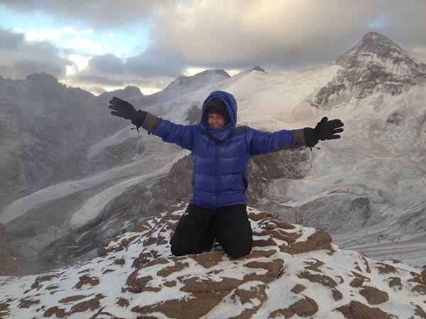 Viridiana enjoys the view from the top of Mount Aconcagua in Argentina