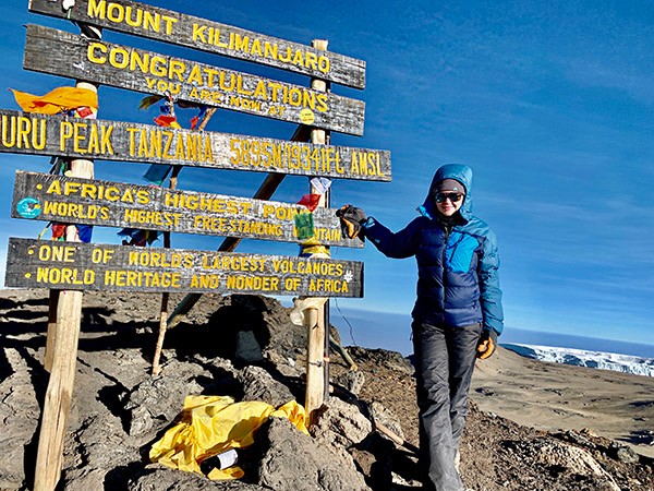 Viridiana on the top of Mount Kilimanjaro in Tanzania