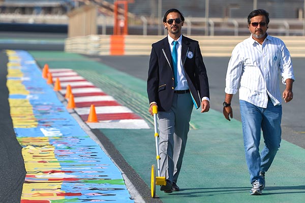 adjudicator measuring a record